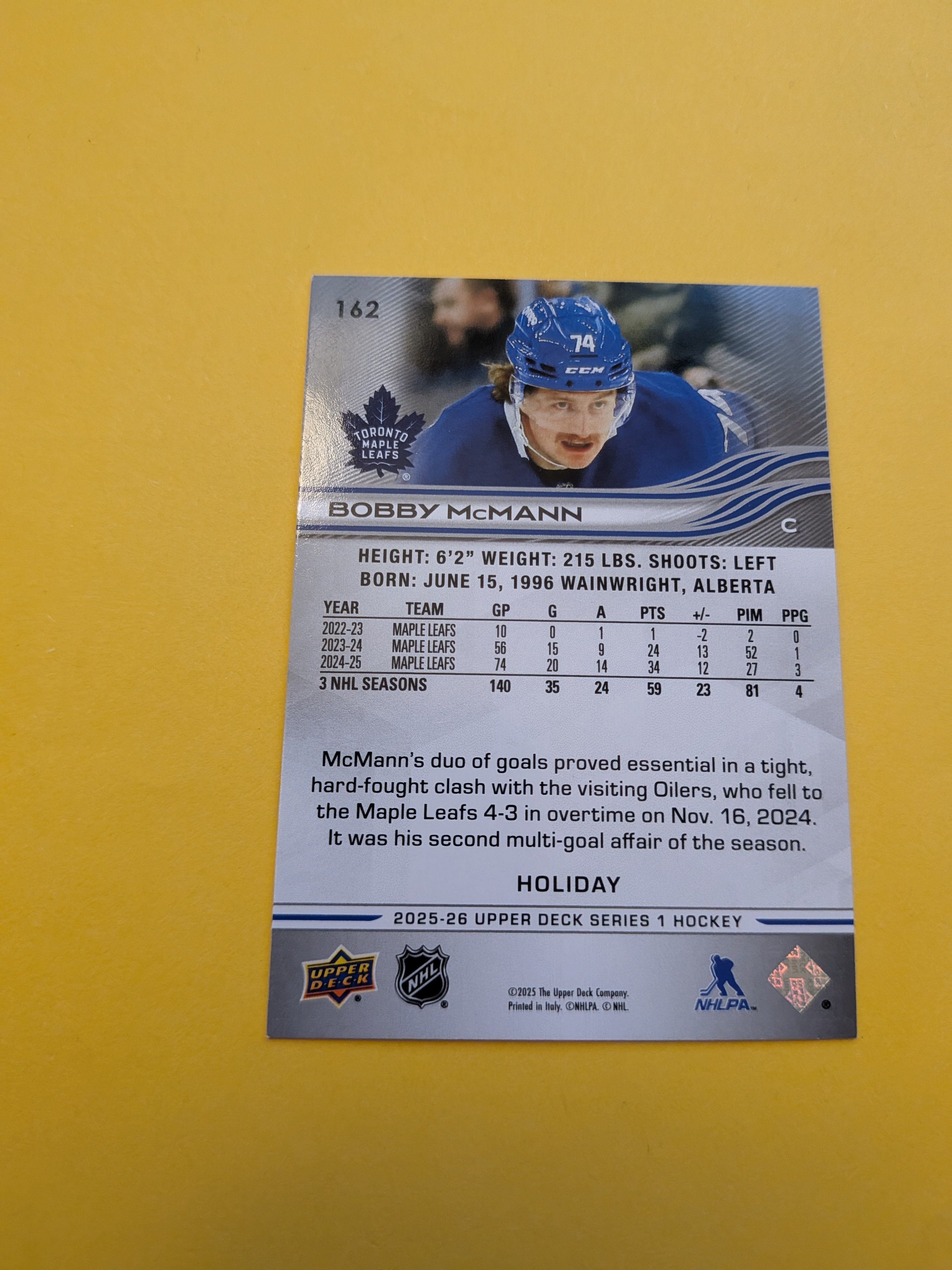 Bobby McMann 25-26 Upper Deck Green Holiday Card