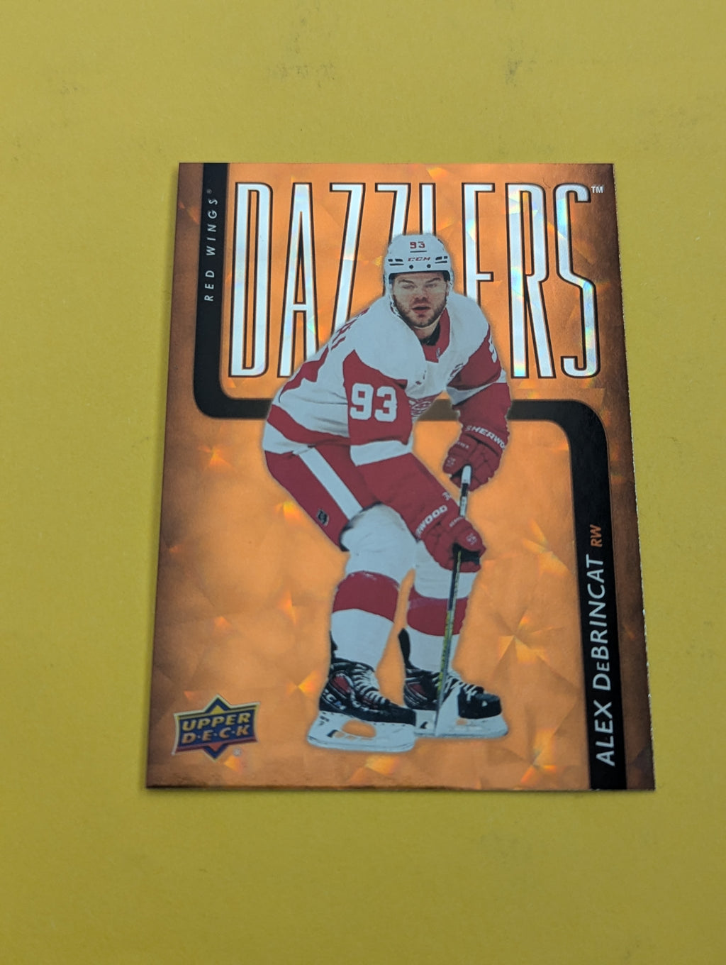 Alex Debrincat 25-26 Upper Deck Dazzlers Orange Card