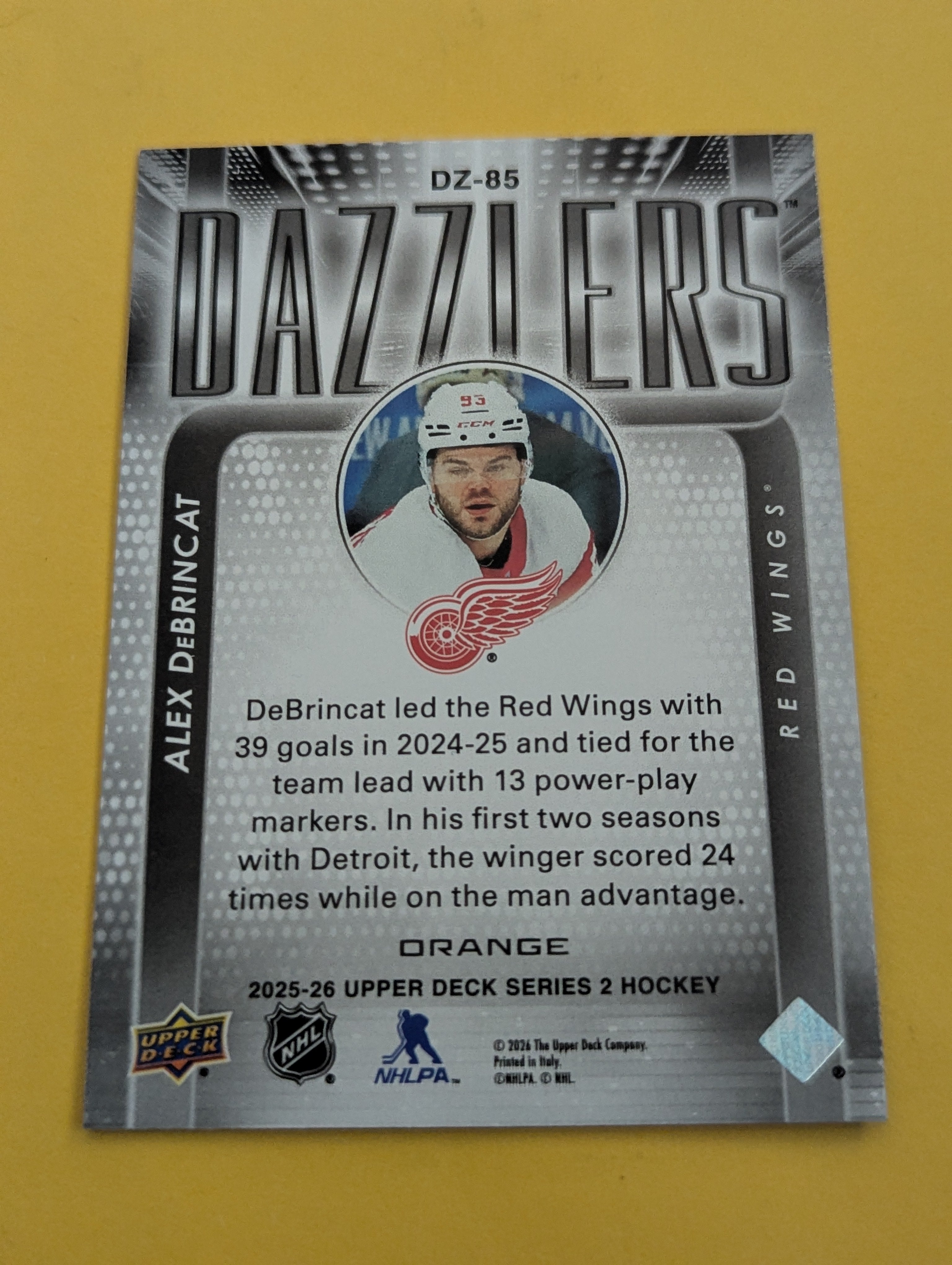 Alex Debrincat 25-26 Upper Deck Dazzlers Orange Card