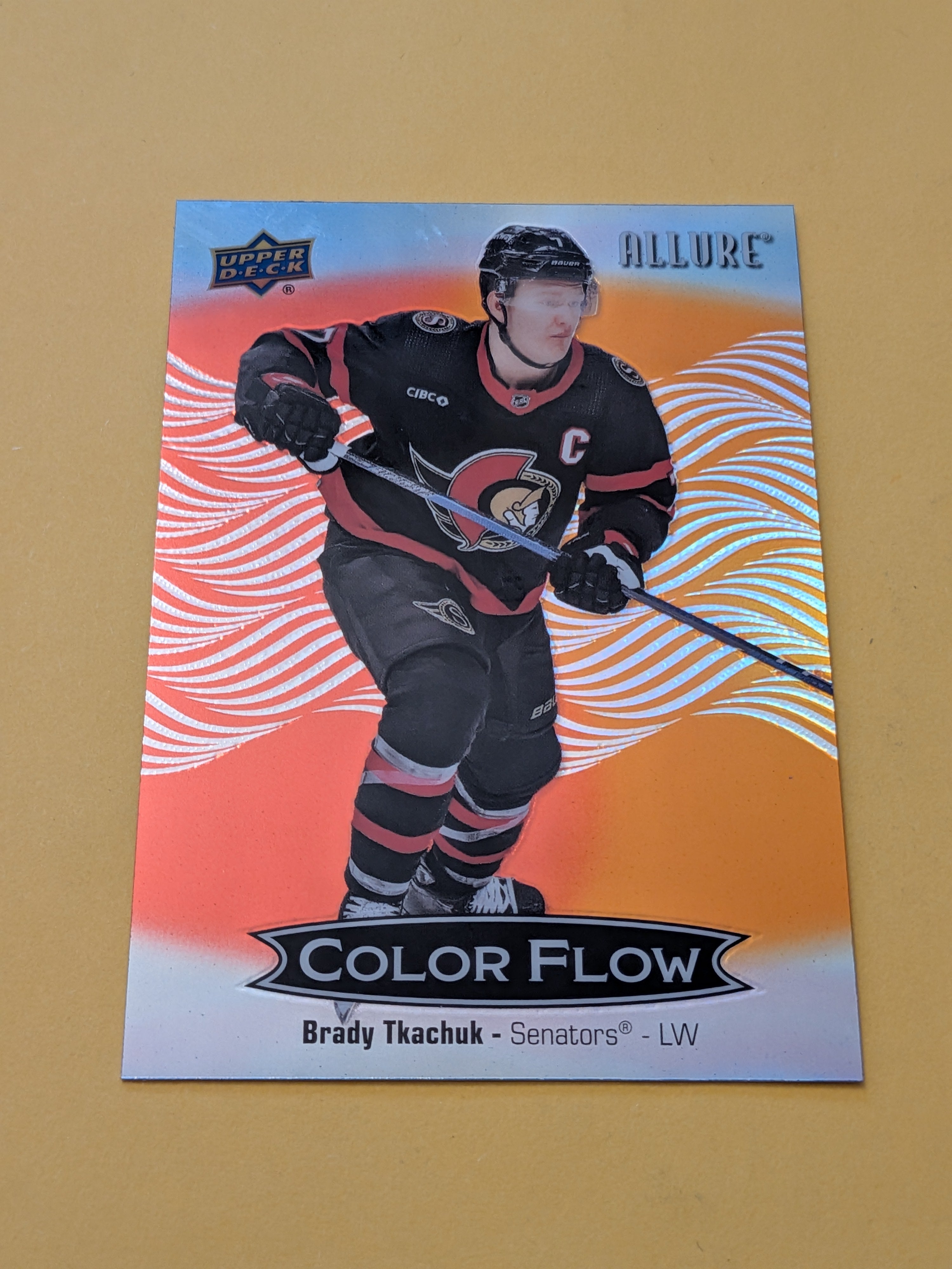 Brady Tkachuk 24-25 Allure Color Flow Red Orange Card